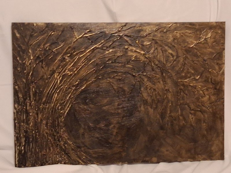 Brown abstract artwork with layered brush and texture marks