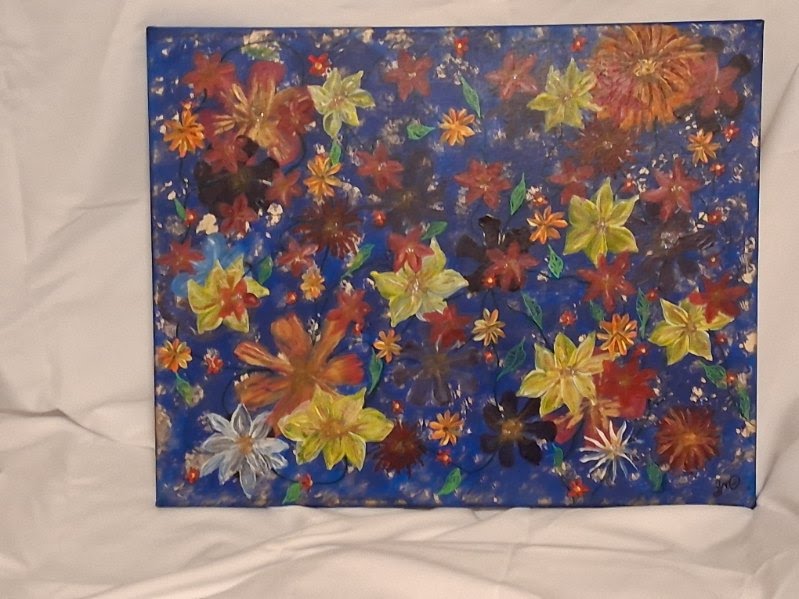 Colorful floral artwork photographed against a light background